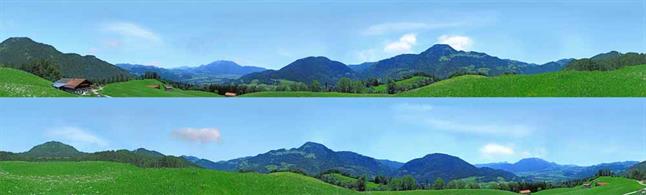 3 metre long photographic backscene sheet featuring a view of the Bavarian hills with chalet style buildings. Suitable for many central European scenes across rural German, Austria and Switzerland.Printed on premium gloss photographic paper with self-adhesive backing. Scaled for N gauge. 9 inch high x 3 metres long. Supplied in 2 1.5 metre sections