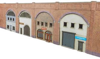 In many towns and cities the railway companies often let out the arch space below their viaducts for business use. This printed card kit from Metcalfe Models allows an 8-arch low-relief viaduct facing to be constructed with a range of business facades to in-fill the arches with shops, workshops and garages.Two kits can be built back-to-back to create a complete viaduct where needed.