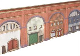 In many towns and cities the railway companies often let out the arch space below their viaducts for business use. This printed card kit from Metcalfe Models allows an 8-arch low-relief viaduct facing to be constructed with a range of business facades to in-fill the arches with shops, workshops and garages.Two kits can be built back-to-back to create a complete viaduct where needed.