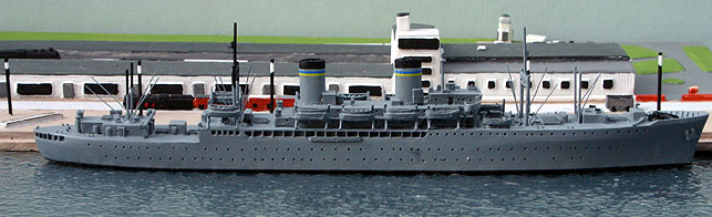 A 1/1250 scale model of USS General William O. Darby troop transport in 1950 by Solent Models SOM19.This ship entered service in the autumn of 1945 as Admiral W. S. Sims AP127 with a voyage to Bombay. There were 8 ships of this type entered military service but two more were completed as liners, President Cleveland &amp; President Wilson. In 1946 she was transferred to the US Army and re-named and in 1950 she was transferred to the MSTS and gained the funnel band on this model. During the Berlin Airlift and after, she made 135 trips into Bremerhaven (the photograph shows her against the quayside at the Coastlines model of the Columbus Bahnhof).