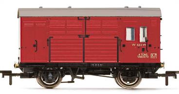 Detailed model of British Railways ex-GWR diagram N13 horse box W665 finished in BR crimson livery.These 1930s built horse boxes ran across the railway network to and from racing meets until the rail transport of livestock ceased in the 1960s.