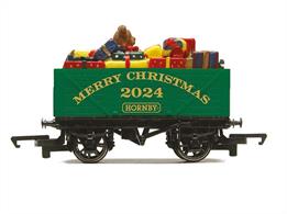Get into the festive spirit and treat yourself with this 2024 Hornby Christmas wagon. Featuring a vivid green livery, it is reminiscent of a real Christmas tree by the fire. The wagon is also filled to the brim with wonderful presents. Celebrate the holidays by adding this wagon to your model railway collection.