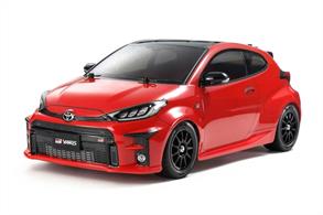 Announced in 2020, this 4WD sports car boasts a compact three-door hatchback body. It features different exciting grades: the high power RZ and the high performance RZ, the RC competition spec, and the FF layout RS model. All are paired with the GR-FOUR sports 4WD system and a 272hp 1.6-liter 3-cylinder engine. This R/C model assembly kit captures such features the prominent radiator grille, bulging rear fenders and roof rear spoiler, and recreates the powerful body in polycarbonate. The front wheel drive M-05 chassis facilitates a lively driving experience, and uses black 11-spoke wheels with tires carved with realistic tread patterns.