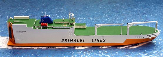 A 1/1250 scale metal waterline model of Grimaldi Lines vehicle carrier Grande San Paolo of the Grande Amburgo class by Rhenania Rhe186E. A load of containers and vehicles is available to fit this model at extra cost, see Rhe186Z. There is also a diorama version of this class of ship model with interchangeable loading door and loading ramp, see Rhe186ED. Rhenania has also made a deck load which fits all the models, see Rhe186Z.