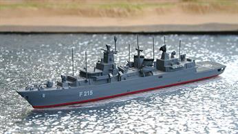 A 1/1250 scale second-hand model of a German Brandenburg-class frigate F215 by Albatros SM Alk52. This model is in excellent condition and has F215 on the hull but no i. d. letters on the helicopter deck and has red boot topping, see photograph