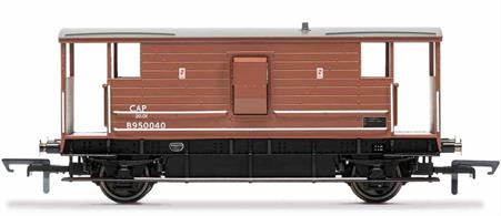 Until 1968, fully fitted freight trains were required by law to be carry a break van at the end. The brake van provided brake functionality to help slow the train as well as acting as a space in which the trains guard could carry out additional duties such as paperwork. As a result most brake vans featured a stove and desk on top of the brake apparatus. The London, Midland and Scottish Railway (LMS) built 2653 20 ton break vans between 1933 and 1947. These featured a wooden structure that spanned most of the frame, with open covered areas at either end to provide the guard with an excellent view of the train.