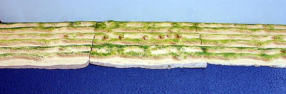 A 1/1250 scale model of a double row of coastal sand dunes by Coastlines Models CL-LA05(c+2xb) in polyurethane resin. The set comprises three modules with a total length of 72cm (30 inches), see photograph.