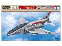 This Tamiya 61121 of the MD F-4B Phantom 2 Jet Fighter is a 1/48 scale plastic model assembly kit. Fuselage length: 370mm, wingspan: 244mm.Exhaustive studies of the actual aircraft enabled this precise recreation of the distinctive form. The parts breakdown offers ease of assembly. J79-GE-8 engine nozzles, cockpit, and landing gear bays are realistically recreated. Choose between folded and extended wingtips. One-piece horizontal stabilizer right and left sides move in concert. Choose between open and closed canopy, and extended and retracted refueling probe/boarding ladder. Different types of antennae and cockpit consoles can be chosen depending on the marking option selected. Air-to-air missiles (AIM-7E Sparrow and AIM-9G/H Sidewinder) and two types of drop tanks are included. Includes 2 sitting crew figures, 3 marking options, and masking stickers.