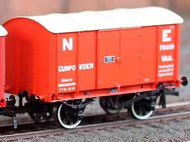 Detailed N gauge model of British Railways long-wheelbase Conflat P wagon number B932956 loaded with containers A593B and BD7335B painted in crimson livery.The Conflat P wagons were converted from plate wagons, fitted with roller bearings and revised springing for the CONDOR express container goods service.