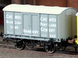 Wagons constructed to the the iron mink design were offered by several private wagon builders, with wagons being constructed for railway companies and private operators. Cement companies purchased a significant number of these wagons, the iron bodies offering a very good level of weather protection, essential for a load which needed to arrive perfectly dry.Model finished as Greaves of Harbury blue lias portland lime cement van number 242, with lettering suggesting it may be on hire from the GWR.