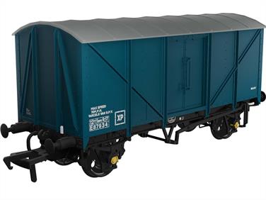 Detailed N gauge model of British Railways long-wheelbase Conflat P wagon number B933601 loaded with containers A3568B and BD6628B painted in bauxite livery.The Conflat P wagons were converted from plate wagons, fitted with roller bearings and revised springing for the CONDOR express container goods service.