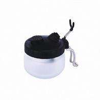 Airbrush cleaning pot, glass with plastic lid, used to spray-clean airbrush. The airbrush is inserted into the opening of the plastic lid and is cleaned by spraying Vallejo Airbrush Cleaner VAL099, VAL199 or water into the container.