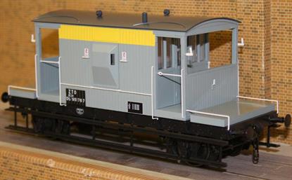 A detailed ready-to-run model of the British Railways standard 20ton goods train brake van fitted with sprung buffers and screw or instanter couplings.Model finished as van DB951767 allocated to the engineering department and painted in the engineers grey and yellow 'Dutch' liver. Carrying TOPS code ZTO indicating the van is not equipped with guards' valves for operating train brakes and has the early build spindle buffers and plain bearings.