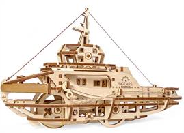 The Ugears Tugboat mechanical model kit is comprised of 169 parts made of sustainably sourced high grade wood and has everything you will need for assembly (including thread, hooks and ropes). The quality of the parts is top-notch: a laser method is used for cutting items from a plywood board that provides precise hairline cuts. The details have to be pulled out of the boards and assembled to create a complete model. Like all other Ugears models, the Tugboat comes with step-by-step, full-color, truly easy to follow instructions in 11 languages (English, German, Ukrainian, French, Polish, Spanish, Russian, Japanese, Italian, Chinese and Korean) and requires neither glue nor special tools to be fully assembled into functional Tugboat.