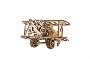 The Mini Biplane wooden mechanical model has a turning propeller powered by a rubber band motor—just pull the model back along a surface to wind it up, then release and watch it go! No glue or special tools are required to assemble this DIY kit, just punch the pre-cut pieces out of their composite wood boards and snap them together. When assembling the airplane model, remember to lightly sand and wax the moving parts to make them run smoothly.The model's toy-like appearance and simple mechanics make the Mini Biplane an excellent starter model and introduction to the fascinating world of Ugears 3D puzzles, DIY model kits, automatons, robots, wooden puzzle boxes and STEM Lab model kits.
