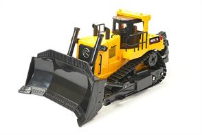 HUINA 1/16 2.4G 11CH RC HEAVY BULLDOZERtransmitterWhen it comes to earth movers you don’t mess with a bulldozer. Now Huina have introduced this new entry level variant, perfect for all pockets and ages. With 11-functions ranging from sound effects, lights, simula-tion mode, bucket movement and rear ripper lift to highlight just some.With a host of scale features replicated from a full size bulldozer, this 1:16th scale R/C model is ready when you are to take on your next job.