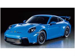 This R/C model assembly kit recreates the Porsche 911 GT3 (992) with a stunning and highly detailed polycarbonate body. The kit is based on the beginner friendly and highly customizable TT-02 chassis. The full-size 7th generation model, Porsche 911 GT3 features double-wishbone front suspension – changed from MacPherson strut – and a horizontally opposed 6-cylinder engine. Lightweight components and aerodynamic design extensively improved its performance. Carbon fiber reinforced plastic front hood, which was employed for production vehicles for the first time, gives lightweight design. Also, hanging type wing stay supply greater downforce and lower drag.