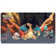 Playmat with premium fabric top to prevent damage to cards during game play. Dimensions are approximately 24" X 13-1/2". Rubber backing lets the playmat lay flat and prevents the mat from shifting during use. Features a Scorching Summit scene!