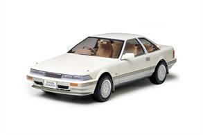 1/24 scale assembly kit of the Toyota Soarer 3.0GT Limited. This model depiction carries the highest trim level of the 2nd generation Soarer which debuted in 1986. It incorporated a 3-liter 24-valve DOHC 6-cylinder turbocharged engine as well as electronically controlled suspension to achieve a balance of performance and comfort.