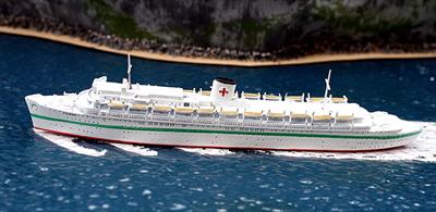 This Wilhelm Gustloff is a hospital ship version of the former German cruise ship after she had been requisitioned for war service in August 1939. The model was bought new in the International Maritime Museum im Hamburg and professionally re-fitted with painted wood effect decks and new insignia and green stripe fitted for display purposes. The original metal waterline model was finely cast by CM Miniaturen, CM-P61 and is in 1/1250 scale, see large photograph.The small image shows a model in ex-works condition.