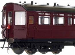 A highly detailed model of the GWR diagram N driving trailer or auto coaches built in 1907 to diagram N numbered 37 to 41. These wood bodied coaches featured the panelled construction of the period which Dapol are faithfully reproducing, along with fully detailed interior including driving cab with controls and saloons with their mix of side bench and cross seating bays. The underframe carries retractable steps, brake fittings and gas reservoirs for the lighting, complemented by detailed reproductions of the GWR 'American' bogies with their prominent drop-equaliser beams.This model is finished in the British Railways maroon livery, 1957.