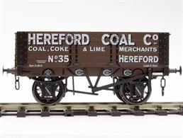 Detailed model of Hereford Coal Company wagon number 35, a RCH 1887 specification 5 plank open wagon of 8 tons capacity.Model features the grease lubricated axleboxes and single-side brakes fitted to these wagons when new, along with printed registration plate and a set of Gloucester builders, owners (leasor) and repair plates along the solebar.