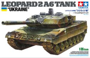 This model kit recreates the Leopard 2 A6 Tank with molded parts and accessories from Item 35271 1/35 Leopard 2 A6. This edition includes new decals depicting the Ukraine army flag, complementary painting guide and new packaging. In January 2023, the German government announced that it would send fourteen Leopard 2 A6 tanks to Ukraine, later adding a further four: as of March 2023, it was planned to send a total of eighteen. The included new decals in this kit depict a white cross, a symbol historically used in Ukraine by groups such as Cossacks.