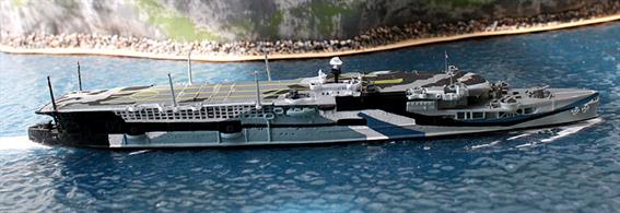 HMS Furious is a 1/1250 scale metal waterline model of the Royal Navy pioneering aircraft carrier in 1943 painted in an Admiralty Standard camouflage pattern. The model is made by WDS in Germany and has the catalogue number WDS K Liz 0112aT.