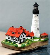 Portland Head Lighthouse is a 1/1250 scale 3D printed lighthouse model. The old tower seems to be perched on a rock at the edge of the land protecting the keepers accommodation that seems to be sheltering behind it from the worst of the weather. The model will be printed to order by Coastlines Models, CL-L44.