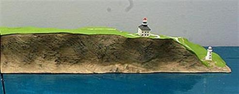 Cape Spear Lighthouses is a 1/1250 scale resin model of the Newfoundland lighthouses mounted on a low relief cliff 3D printed in PLA plastic finished and painted by Coastlines Models, CL-L39.