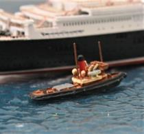 The Clausentum-class tugs received a new livery postwar to match the red funnels of the Cunard liners using the Southampton Ocean Terminal. This 1/1250 scale waterline model represents either Canute or Clausentum from 1946-58 as they emerged from war service and is made by Solent Models number SOM 25b.