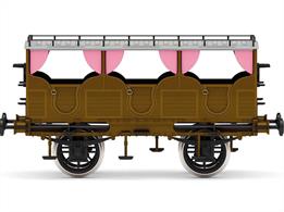 The second class open topped coach sports an L&amp;MR brown livery. The accessory bag contains two chain couplings.
