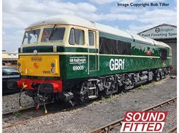 The real Class 69 Diesel Locomotives have been created for GBRf through the conversion of redundant Class 56s and we are delighted to present this Bachmann Branchline OO scale model of Britain’s newest mainline diesel.Produced under an exclusive agreement with GBRf, the Branchline model has been painstakingly developed hand-in-hand with the introduction of the GBRf fleet. With the Class 69s being built from donor locomotives that were first built by three different works and have themselves seen almost fifty years of use and modification, Bachmann has worked closely with GBRf to accommodate any detail differences that were present on the donors and have remained apparent on the rebuilt machines, along with any changes made to the final design of the Class 69 during the ongoing build programme.This diligent approach has resulted in a truly magnificent model which befits the Branchline name, capturing the Class 56 shape to a tee alongside the modern adornments and many changes made to the locomotives to create the 69s.The bodyshell features crisp, accurate mouldings to depict the main features along with separately fitted parts, including etched bodyside and roof fan grilles, metal windscreen wipers and separately fitted driver’s door handrails. Inside the cab there is interior detailing which will be decorated appropriately whilst machine room detailing is visible through the bodyside grilles. The underframe equipment is all present and correct, composed of many separate parts along with sandboxes and sandpipes and sprung metal buffers, but it is the bogies that really bring this model to life. It’s hard to describe these as anything but a work of art, using countless separate components to model every aspect of the bogie in full relief, from the brakes to the suspension, even down to the separately fitted bogie-body securing chains.All of this detail, both inside and out, will be brought to life with an exquisite livery application using true-to-prototype colours, fonts and logos and with the help of GBRf official livery diagrams.Under the body, the Branchline Class 69 features our proven drive system using a 5 pole motor with twin flywheels driving all axles on each bogie. Electrical pick-up comes from all wheels whilst DCC provision comes in the form of a Plux22 interface. Directional lighting is of course provided, along with cab and machine room lighting when used on DCC. The Dual Fitted speaker system is fitted to every model and this is fully utilised in our SOUND FITTED variants.