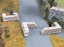 This kit contains 200 individual sandbags allowing arrangement to suit your own scenario. While suggested for military scenes, these sandbags have many other applications such as flood defences. Repainted, they can also be used as bags of cement or any other similarly bagged product.