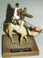Wimsical and very fun model depicting an Afghan fighter mounted on a camel sporting a gatling gun (scratchbuilt from brass). A wry reflection on Afghan wars.Height 8.3", length (camel) 8" and supplied in a display case.
