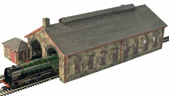 Fully painted resin cast model of a double track engine shed long enough to hold a full-length steam locomotive with tender, or two tank engines on each track. The small office building is included.Locomotives and track are not included.