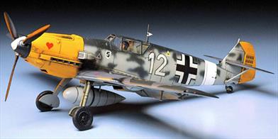 Tamiya 1/48 Messerschmitt BF109E 4/7Trop Fighter Aircraft Kit 61063One of the best fighters of world war 2 was the German Messerschmitt BF109E. Modeled by Tamiya to give an excelent model.Glue and paints are required to assemble and complete the model (not included)