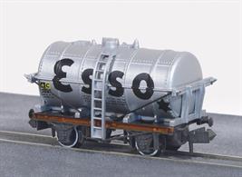 The silver tank and red solebar stripe warn that this Esso tank wagon carries highly flammable products like petrol.