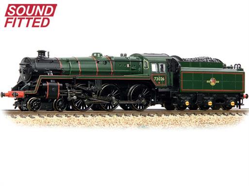These were the BR standard version of the useful and flexible class 5 locomotives developed by the 'big four' companies, incorporating the best features of the Black 5, B1 and Hall classes, along with the standardised fittings and locomotive layout.These 5MT locomotives were capable of undertaking a wide range of duties. Powerful enough to haul express passenger trains and fast goods trains the type were often found working trains which used secondary routes, where larger locomotives were prohibited.This model of 73014 is paired with a BR1 type tender and finished in the BR lined green livery with later lion holding wheel crest.DCC Ready. 6-pin decoder required for DCC operation.