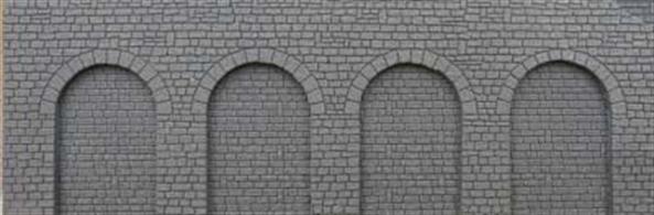 Foam backed embossed sheet featuring recessed arches, suitable for modelling retaining walls and filled-in viaduct arches quickly and easily. The foam backing provides flexibility, allowing the sheet to follow curves. A supporting back structure will be required.Size: 12 x 36cm