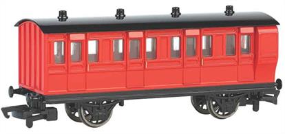 Model of a red liveried brake coach from the Thomas the Tank Engine books and TV series.
