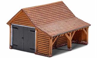 Ready painted cast resin model of a modern timber construction garage.