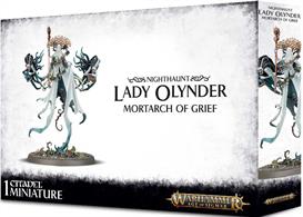 This multi-part plastic kit contains the components necessary to assemble Lady Olynder, Mortarch of Grief. As the Mortarch of Grief, she is surrounded by an aura of absolute misery – this miniature does an impressive job of capturing the bleakness. Hovering above the ground in her ghastly bridal dress and veil, little can actually be seen of her form other than the outline of a skull. Her bridal train, ruined and shredded, flows out behind her, with a wisp of this ethereal garment attaching the miniature to its base. Thorny vines of grave-roses, which sprout wherever she floats, wrap themselves around her waist and up to her headdress, which itself resembles a thorned briar. In her right hand she wields the Staff of Midnight, an ornate stave topped with a polished gemstone of vitrified grave-sand. She is accompanied by 2 macabre Banshee Handmaidens, horrifying skull-faced spectres. Each carries a gift – an ensorcelled grave-sand hourglass given by Nagash himself which can be smashed asunder with lethal effect, and a sealed casket, the contents of which are a mystery; hardly likely to be anything at all positive...  This model comes as 23 components, and is supplied with a Citadel 60mm Round ba