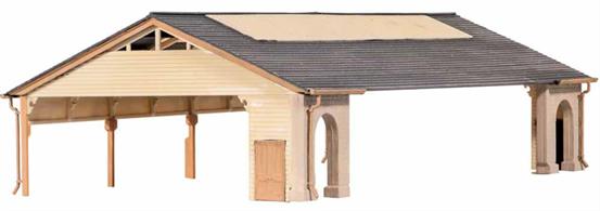 This superb kit is modelled on the overall roof at Ashburton, Devon. Designed for use with Station Building kit (Ref 204), it will enable you to build a GWR station quickly and easily. Although a specific prototype, the design is typical of many other regions including some tropical countries where it was intended to shelter passengers from the sun as well as rain. Supplied with some pre-coloured parts although painting and/or weathering can add realism; glue is required to complete this model. Footprint: 153mm x 82mm