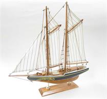 Tasma Products Bluenose Fishing Schooner / Sea Racing Yacht Starter Boat KitThe starter boat kits are a great introduction to model boat and ship building.Designed for speed to get the catch back to port before the days of refrigeration the Nova Scotia fishing schooners were also superb sea-going racing yachts. Bluenose was a noted racing schooner of the 1920s and 30s, commemorated with a replica built in 1963 and rebuilt 2010-13.The kit contains a pre-formed hull and pre-cut wood parts along with fittings, rigging, sails, glue, sandpaper and an instruction sheet to guide the assembly of the model. Even paints and a brush are included.Finished model 33 x 7 x 33cm