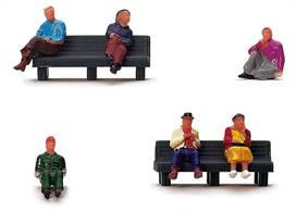 Pack of seated figures to add passengers waiting for the trains at a railway station.