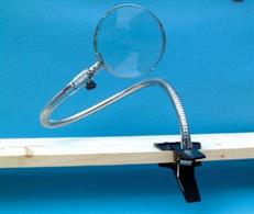 738-69 Gooseneck Magnifier with Bench Clamp.Lens Diameter: 90mm Magn: 2xFlexible Arm: 530mm long.Clamp capacity: 57mm.Clamp has padded jaws to protect work surface. 