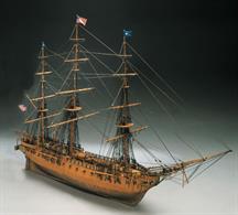 Lovely scale model of the American ship 'Constitution'. Plank on frame construction, the kit contains building plans with English instructions, walnut or lime planking, lost wax castings, wooden masts and spars, brass and walnut fittings, etched brass details, rigging cord and flag. All plywood parts are laser cut for accuracy. Scale 1:98 length 960mm