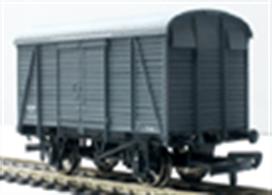 Model of the Southern Railway 2+2 style planked box van, with the distinctive 'wrap-over' roof profile. This model carries GWR goods dark grey livery, ]representing a batch of these vans built for the GWR during WWII.