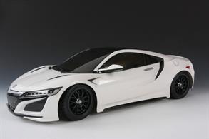 This Radio Control assembly kit model recreates the NEXT GENERATION NSX supercar. The full-size car is a highly technical and utterly thrilling supercar. With weight-saving construction, a hybrid powertrain that has three electric motors and a mid-mounted twin-turbo 3.5-liter V-6 making a combined output of 573 HP, the NSX offers pulse-pounding performance paired with everyday usability. The power plant is mated to a nine-speed dual-clutch automatic, which moves an all-wheel drive train. Tamiya has faithfully reproduced this sleek racing machine in 1/10 scale on the TT-02 entry-level on-road chassis. The TT-02 chassis is the successor to the TT-01 as it incorporates many new features to make it even easier for the new R/C kit builder to assemble and learn from. The TT-02 chassis performs well as cornering and overall speed has been enhanced to take advantage of new electronics available on the market. In addition to the TT-02 being an ideal platform to start from, R/C hobbyists can expand its potential by adding many of the Hop-Up Options available to increase the cars speed and performance.